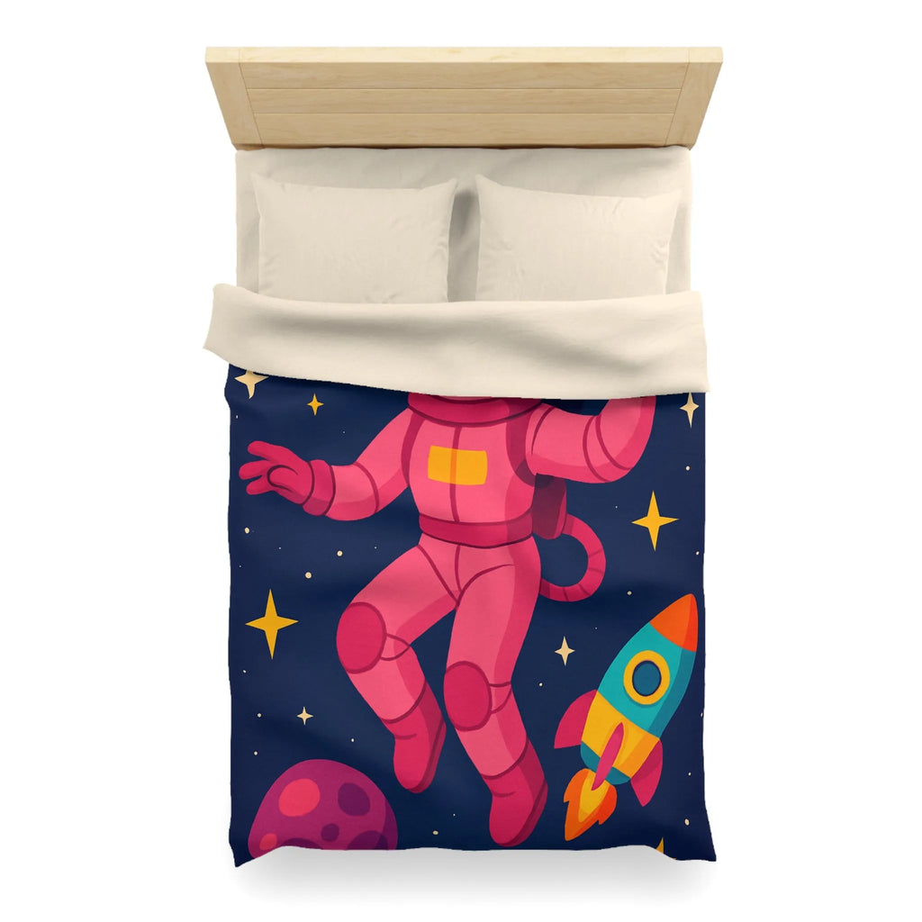 Housse de couette enfant avec astronaute rose et planètes colorées en fond spatial