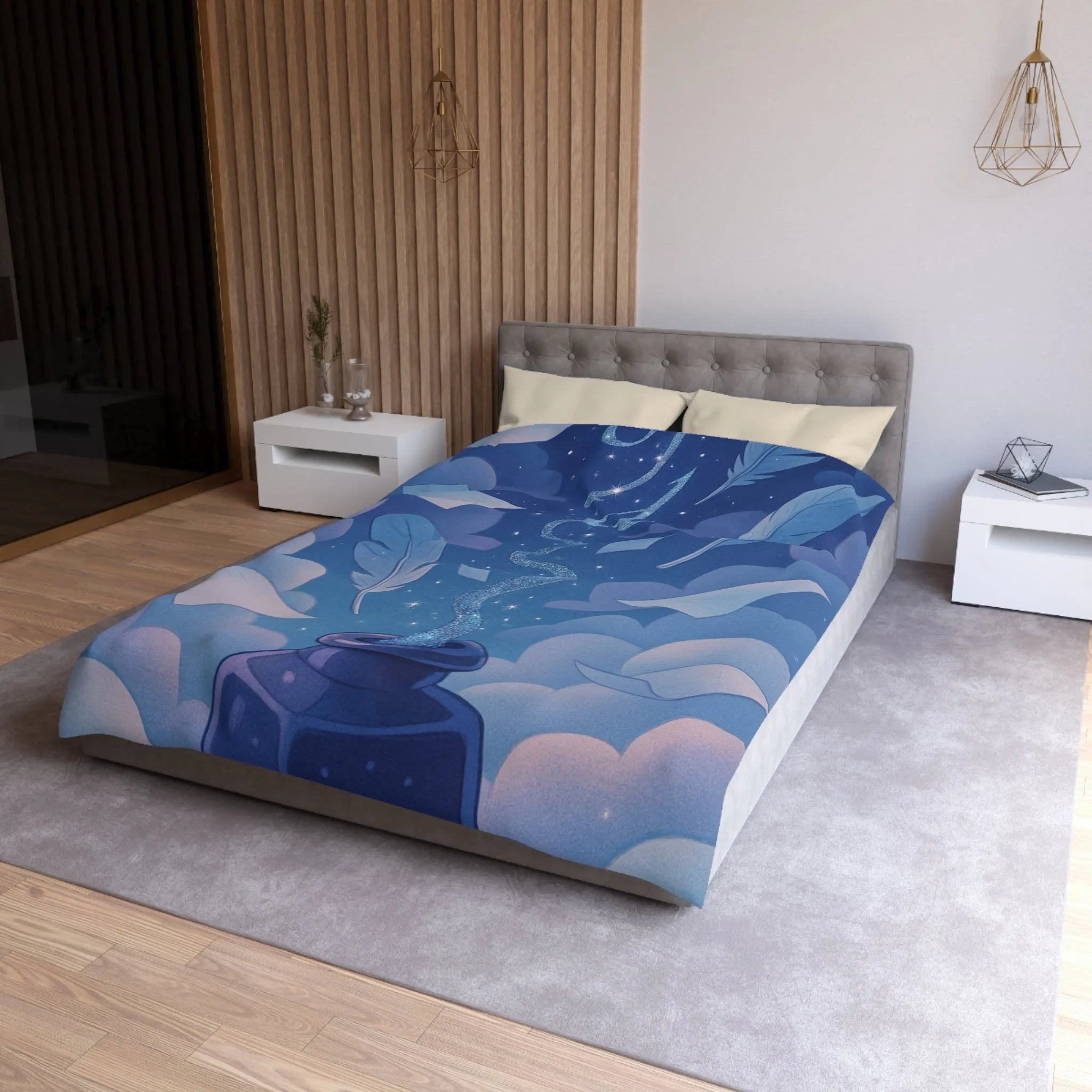 Housse de couette magique avec encre flottante, plumes et nuages rêveurs bleutés