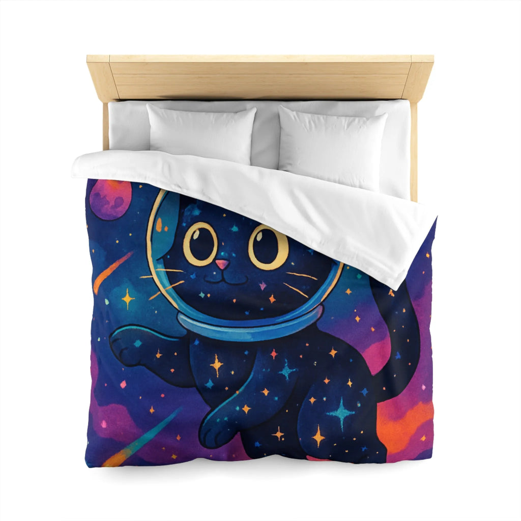 Housse de couette chat cosmique dans l’espace avec étoiles et planètes colorées