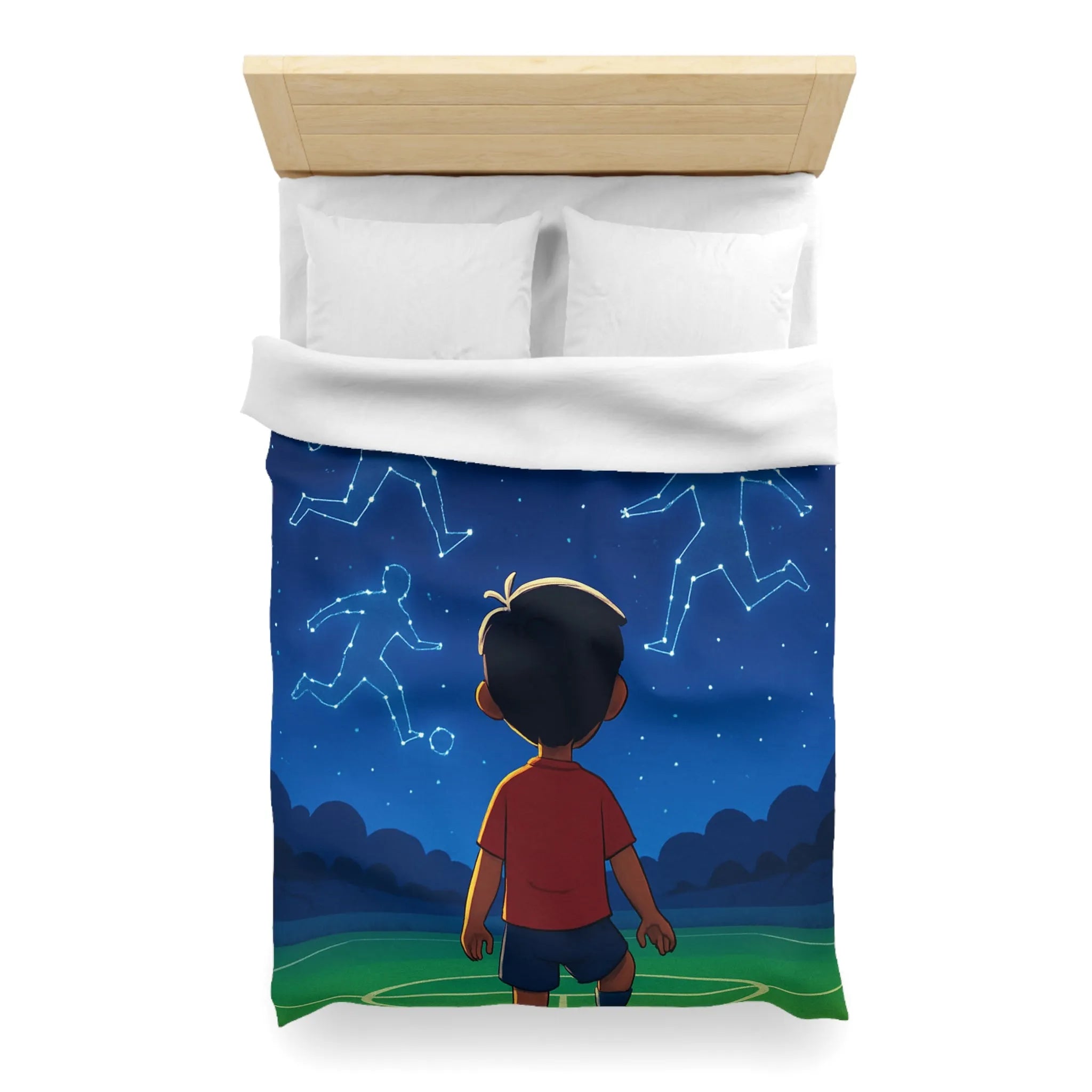 Housse de couette étoilée avec enfant rêvant de football sous ciel constellé
