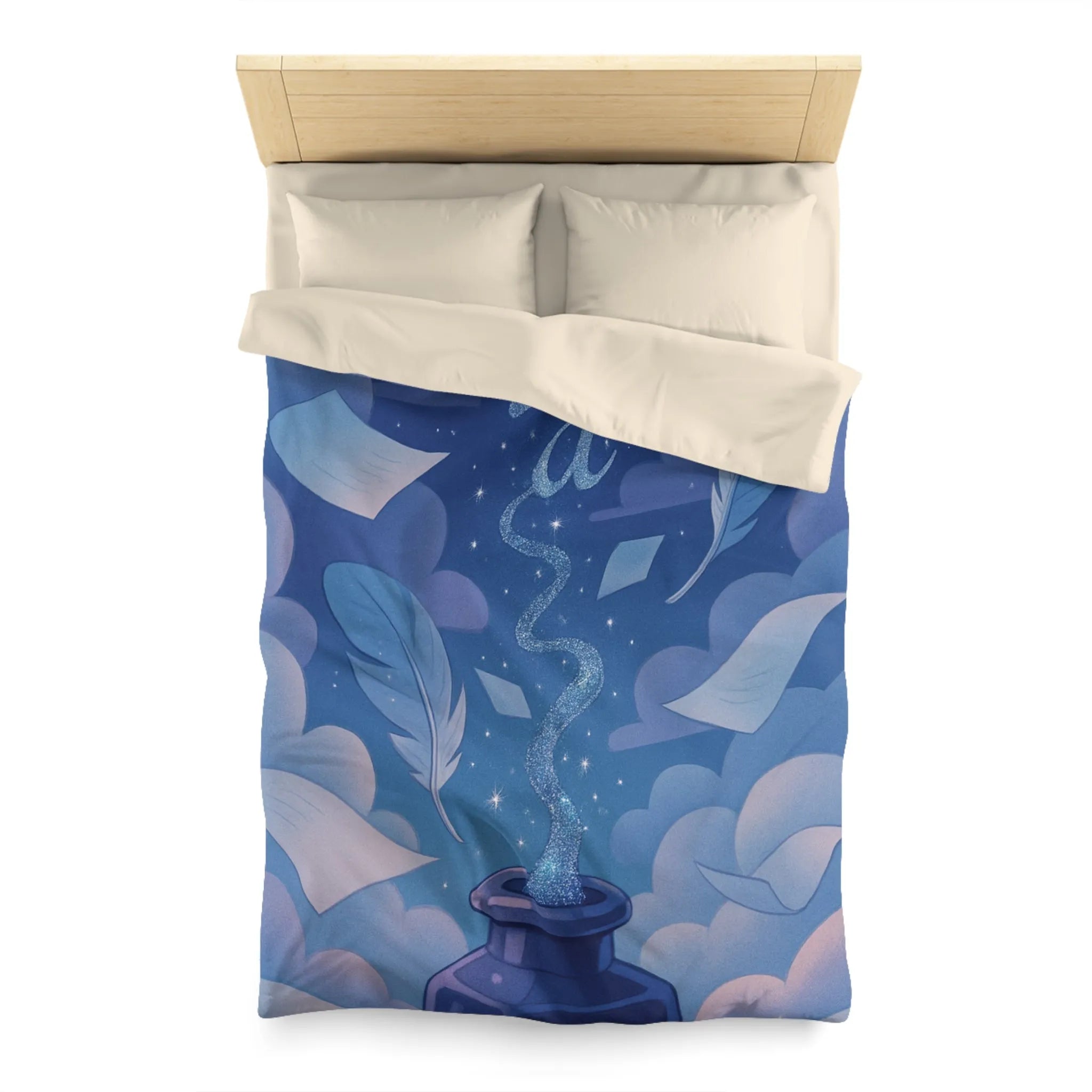 Housse de couette magique avec encre flottante, plumes et nuages rêveurs bleutés