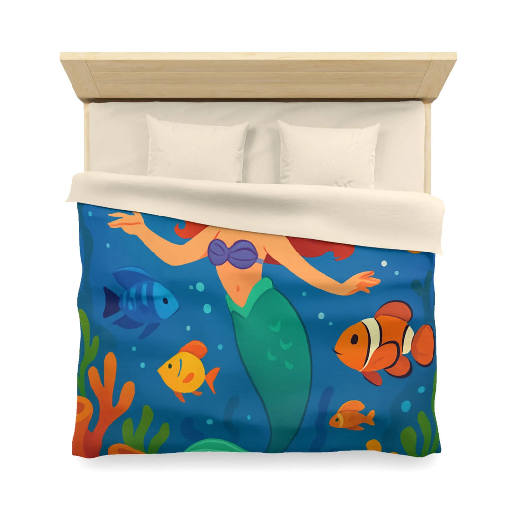 Housse de couette colorée avec sirène joyeuse et poissons dans un océan magique