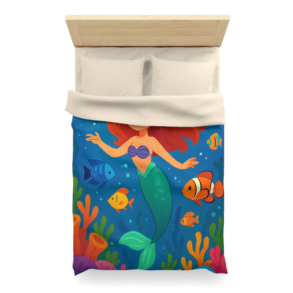 Housse de couette colorée avec sirène joyeuse et poissons dans un océan magique