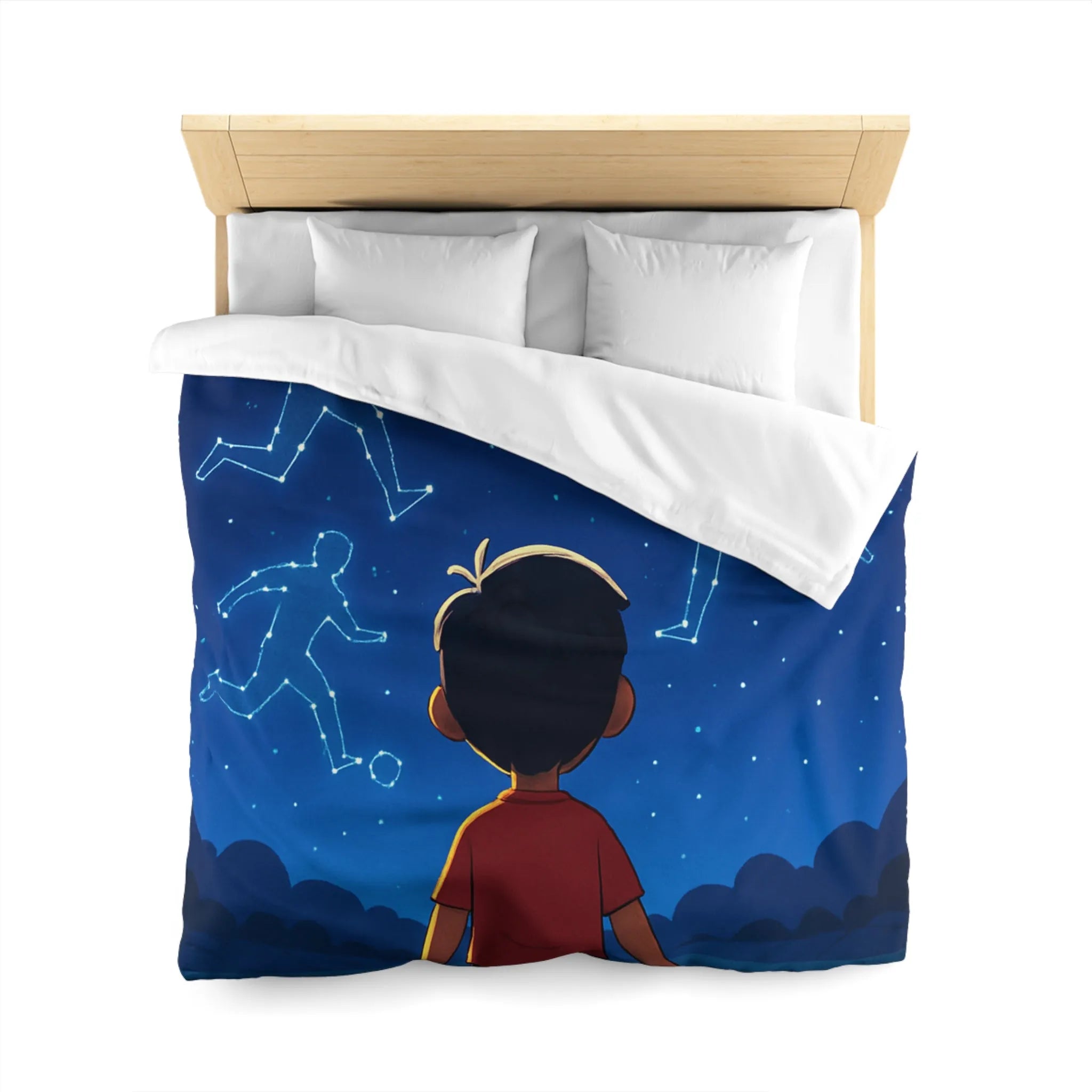 Housse de couette étoilée avec enfant rêvant de football sous ciel constellé