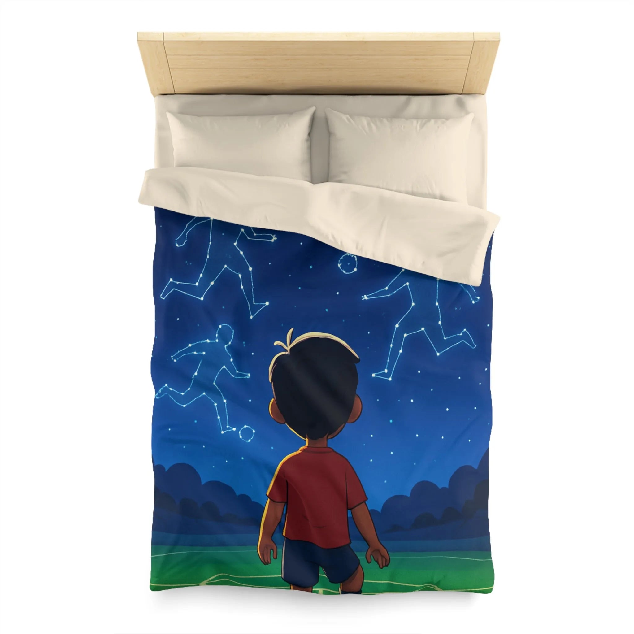 Housse de couette étoilée avec enfant rêvant de football sous ciel constellé