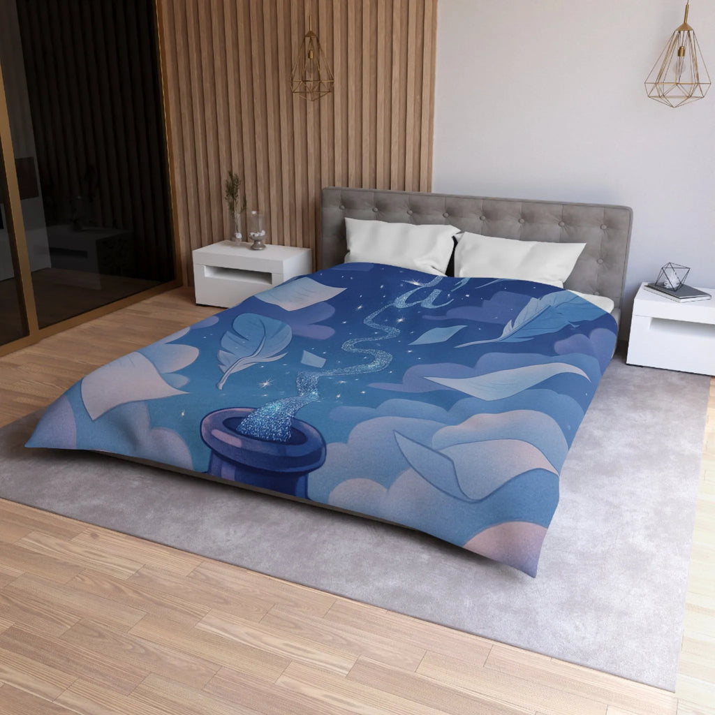 Housse de couette magique avec encre flottante, plumes et nuages rêveurs bleutés