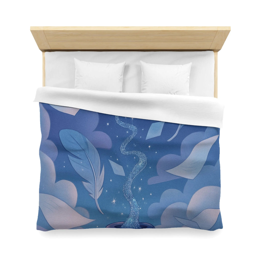 Housse de couette magique avec encre flottante, plumes et nuages rêveurs bleutés