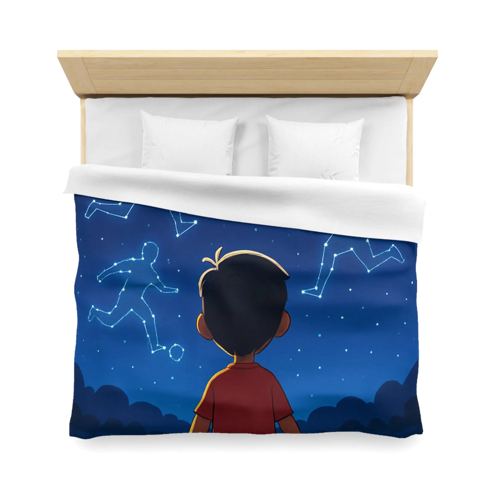 Housse de couette étoilée avec enfant rêvant de football sous ciel constellé