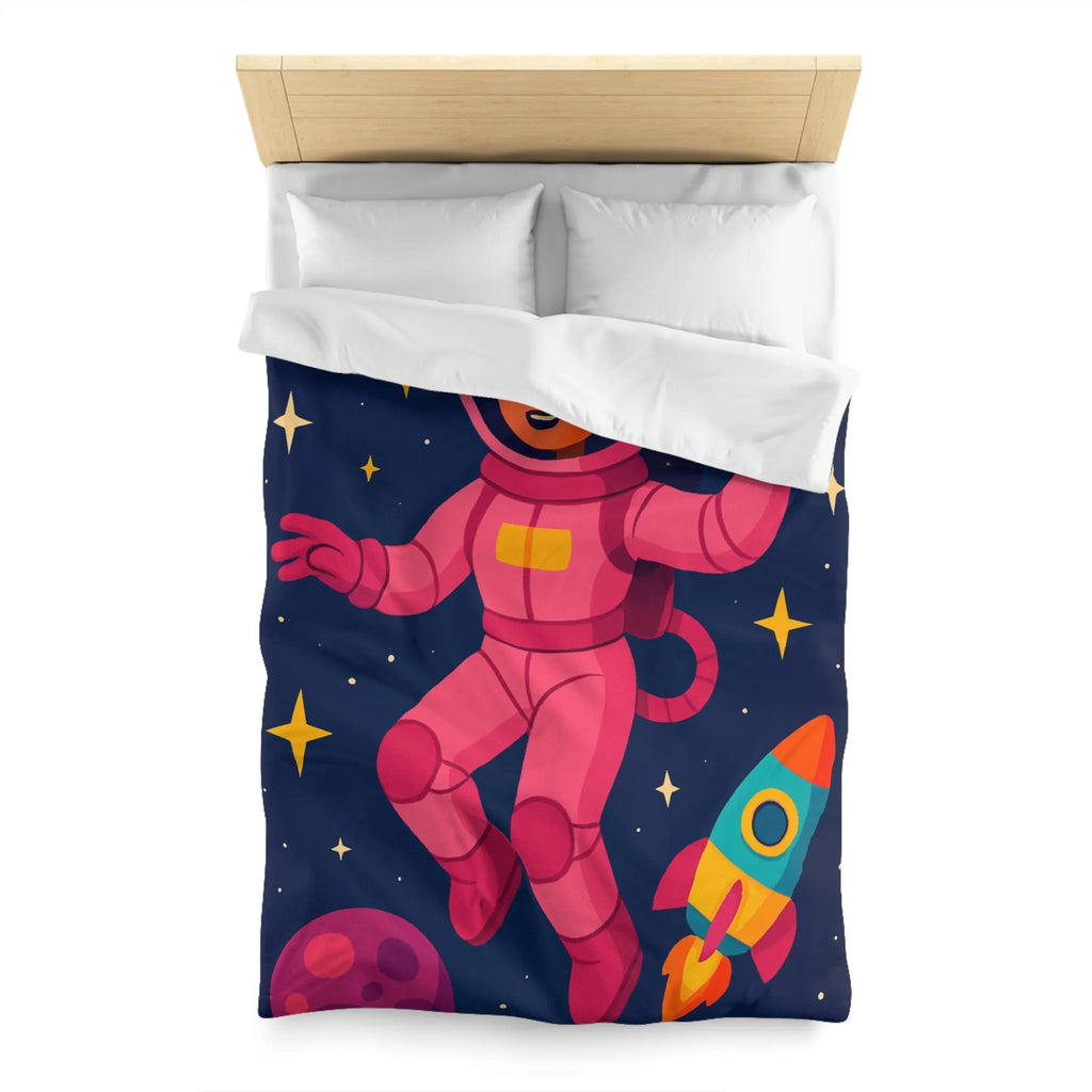 Housse de couette enfant avec astronaute rose et planètes colorées en fond spatial