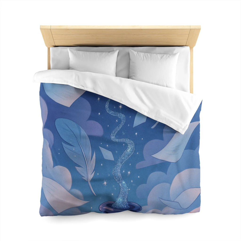 Housse de couette magique avec encre flottante, plumes et nuages rêveurs bleutés