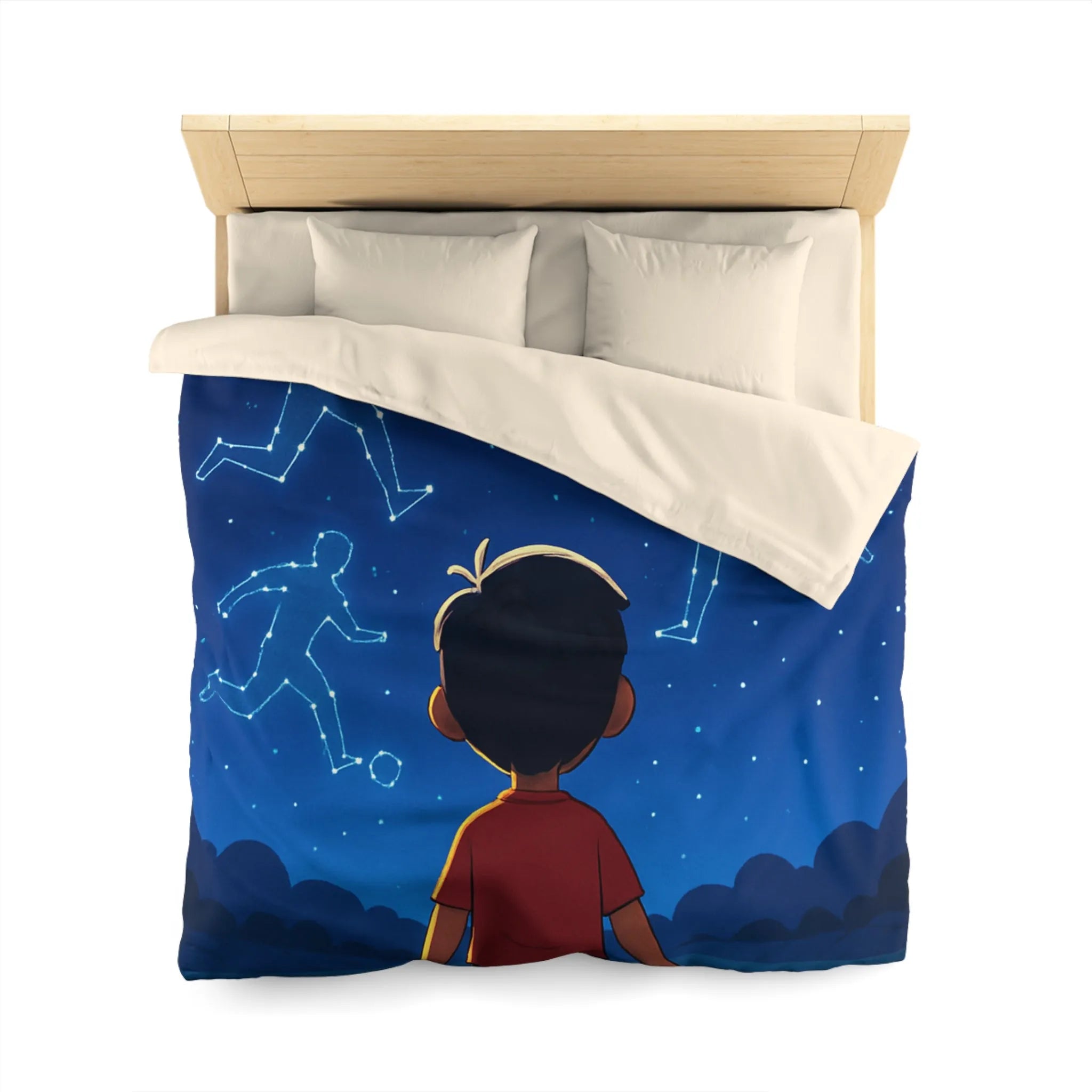 Housse de couette étoilée avec enfant rêvant de football sous ciel constellé