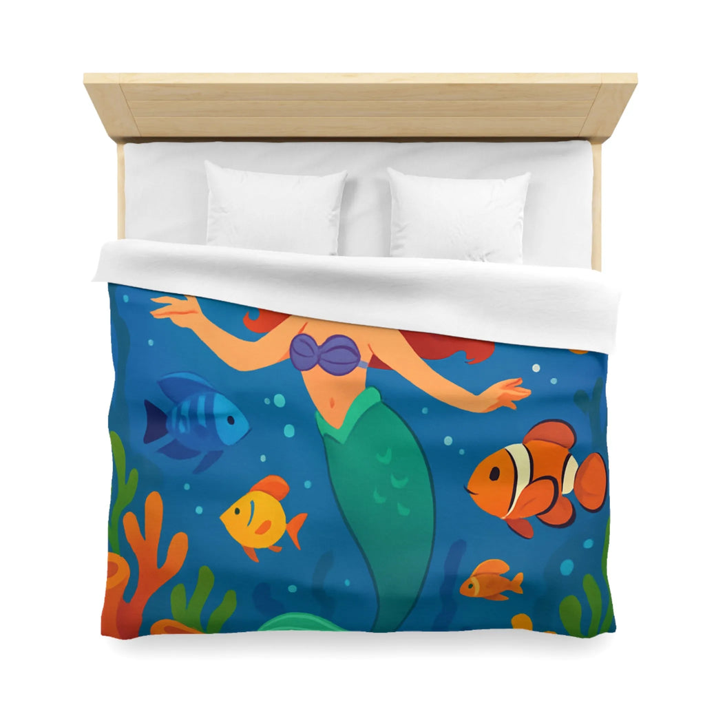 Housse de couette colorée avec sirène joyeuse et poissons dans un océan magique
