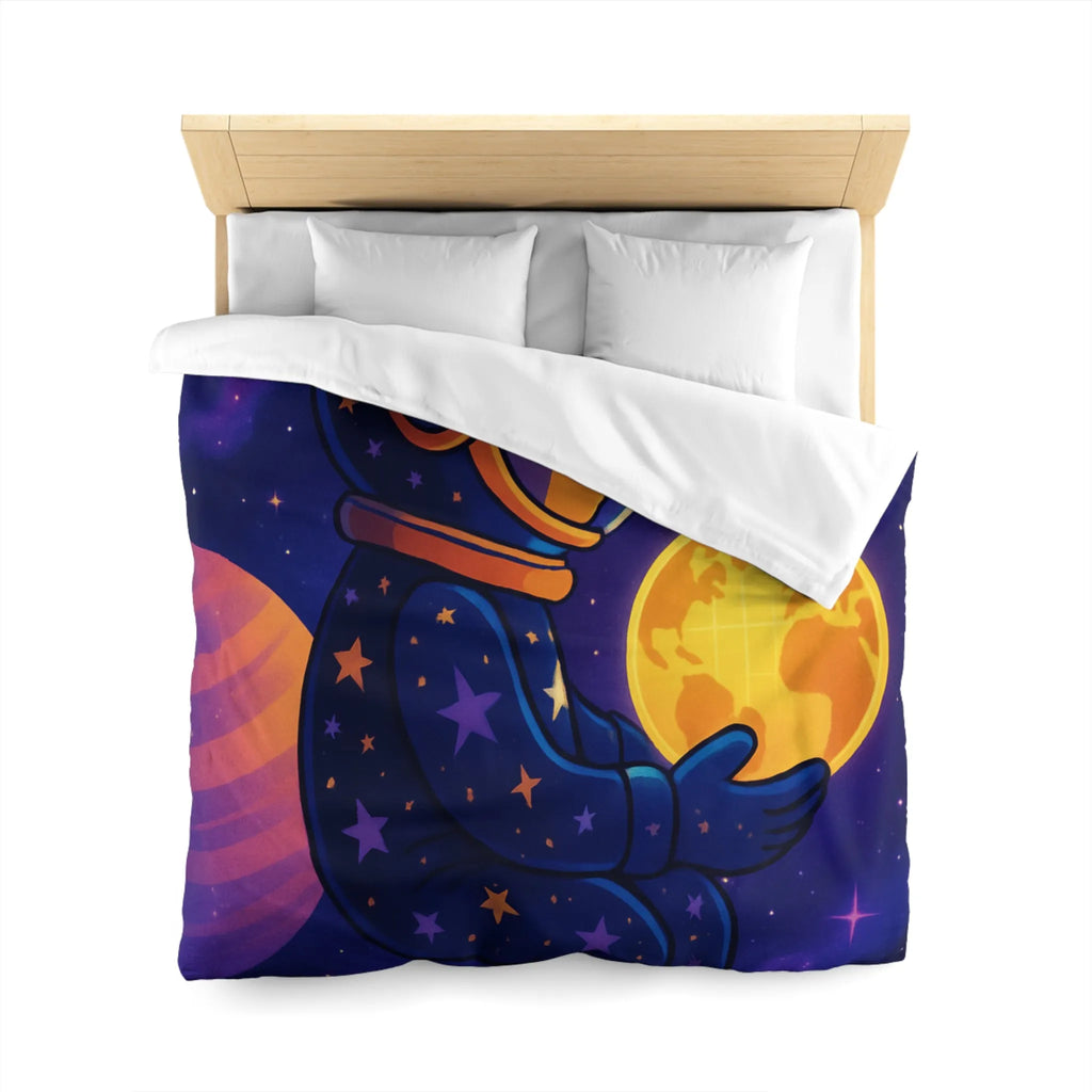 Housse de couette cosmos enfantine avec astronaute rêveur tenant une planète lumineuse